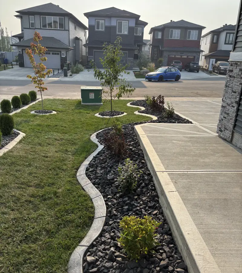 Front yard sod and concrete curbing installation in Edmonton.