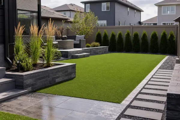 Artificial turf cost Edmonton base preparation and drainage work