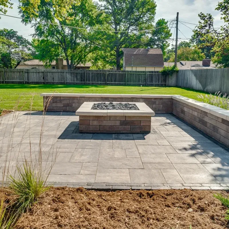 Backyard patio and retaining wall in Sherwood Park