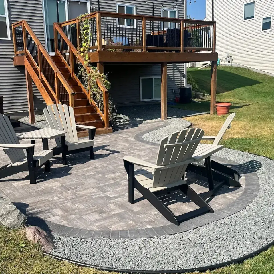 Landscape design and planting at an Edmonton residential property: shrubs, mulch, and garden beds.