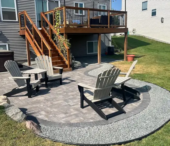 Curved paving stone patio with retaining wall in Edmonton.