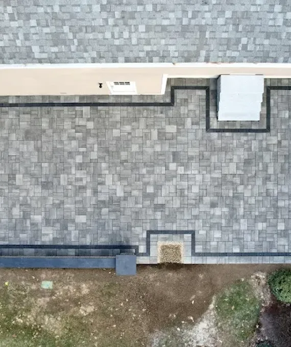 Interlocking paver patio with outdoor living space