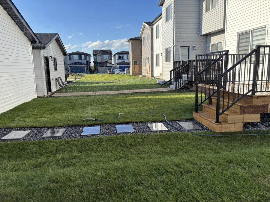 New build landscaping with sod and stepping stones in Edmonton
