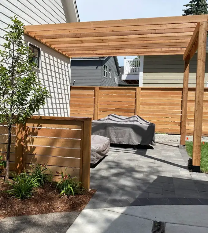 Fence and pergola installation by Serene Landscaping in Edmonton.