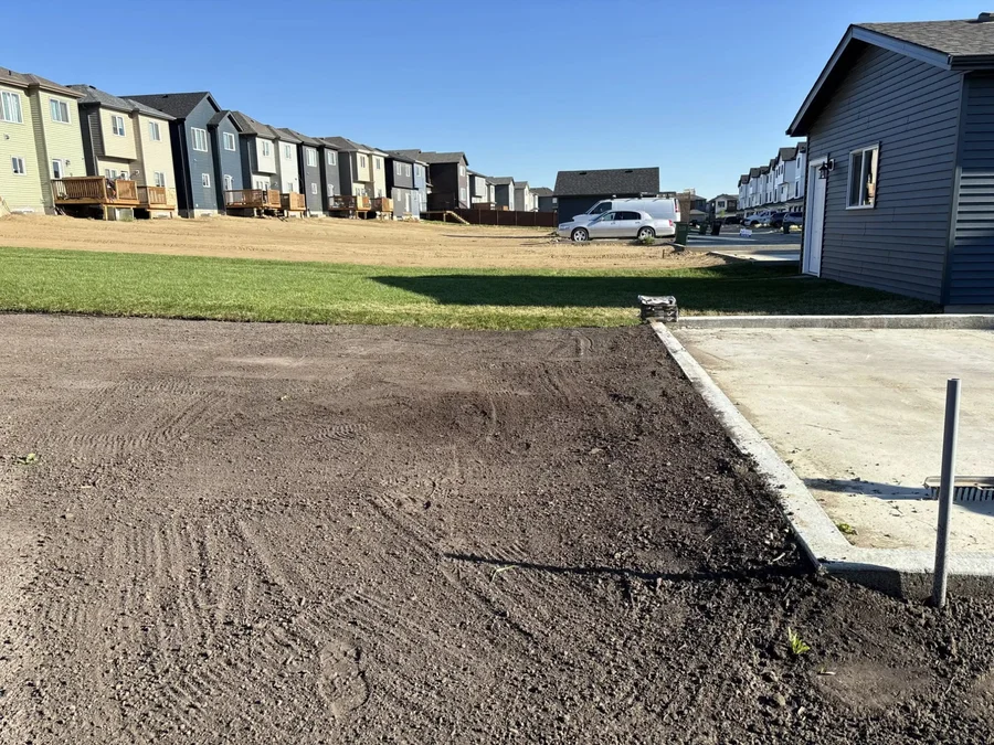 Final grading on a new home front yard in Edmonton