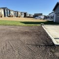 Final grading work on a new home property in Edmonton to complete builder landscaping requirements and recover the landscaping deposit.