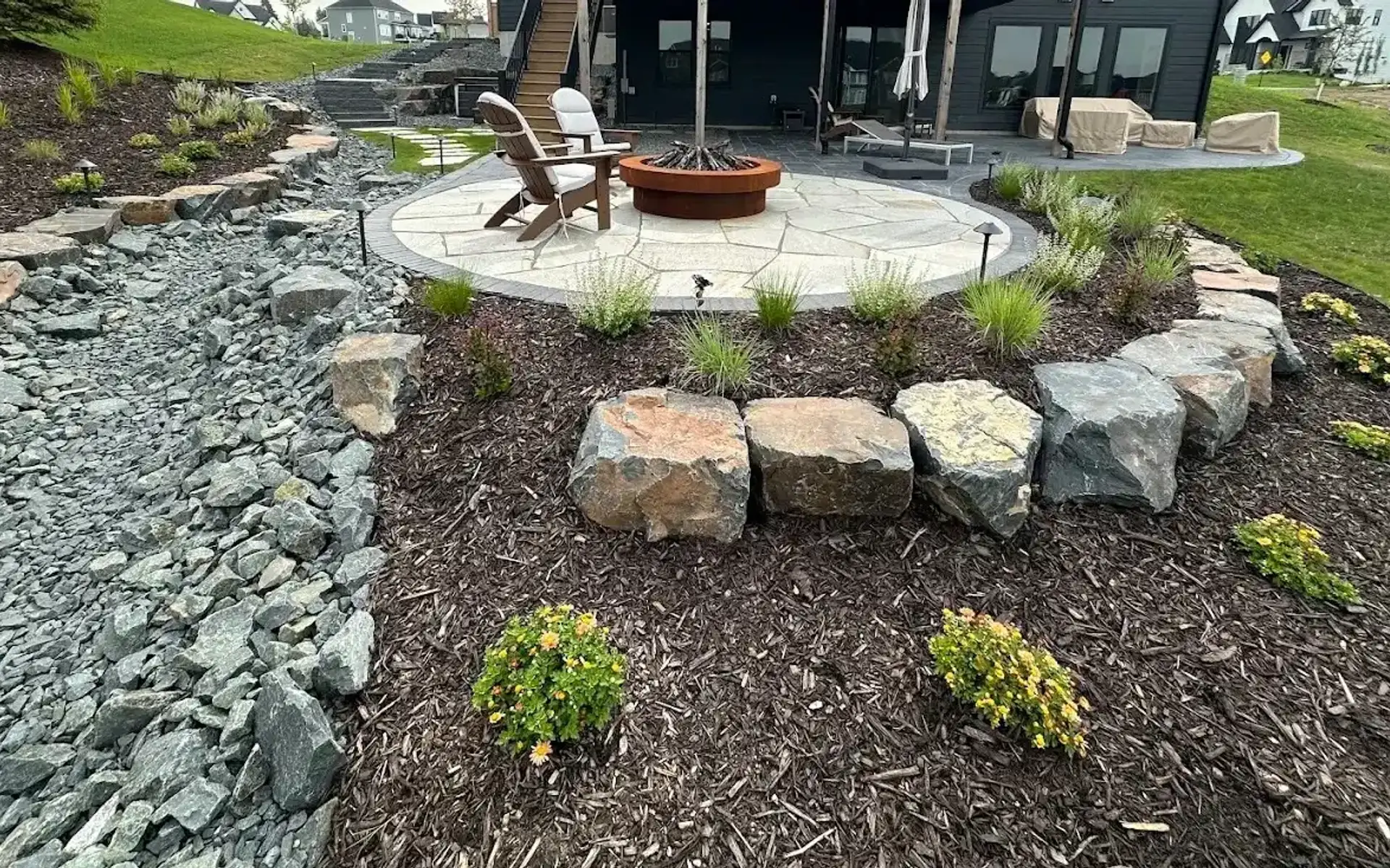 Landscape design and hardscaping installation project in St. Albert by Serene Landscaping.