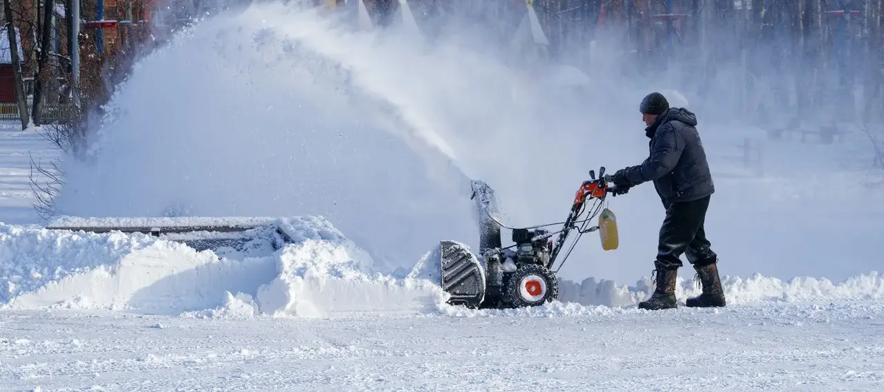 Residential driveway and walkway snow clearing at an Edmonton property.
