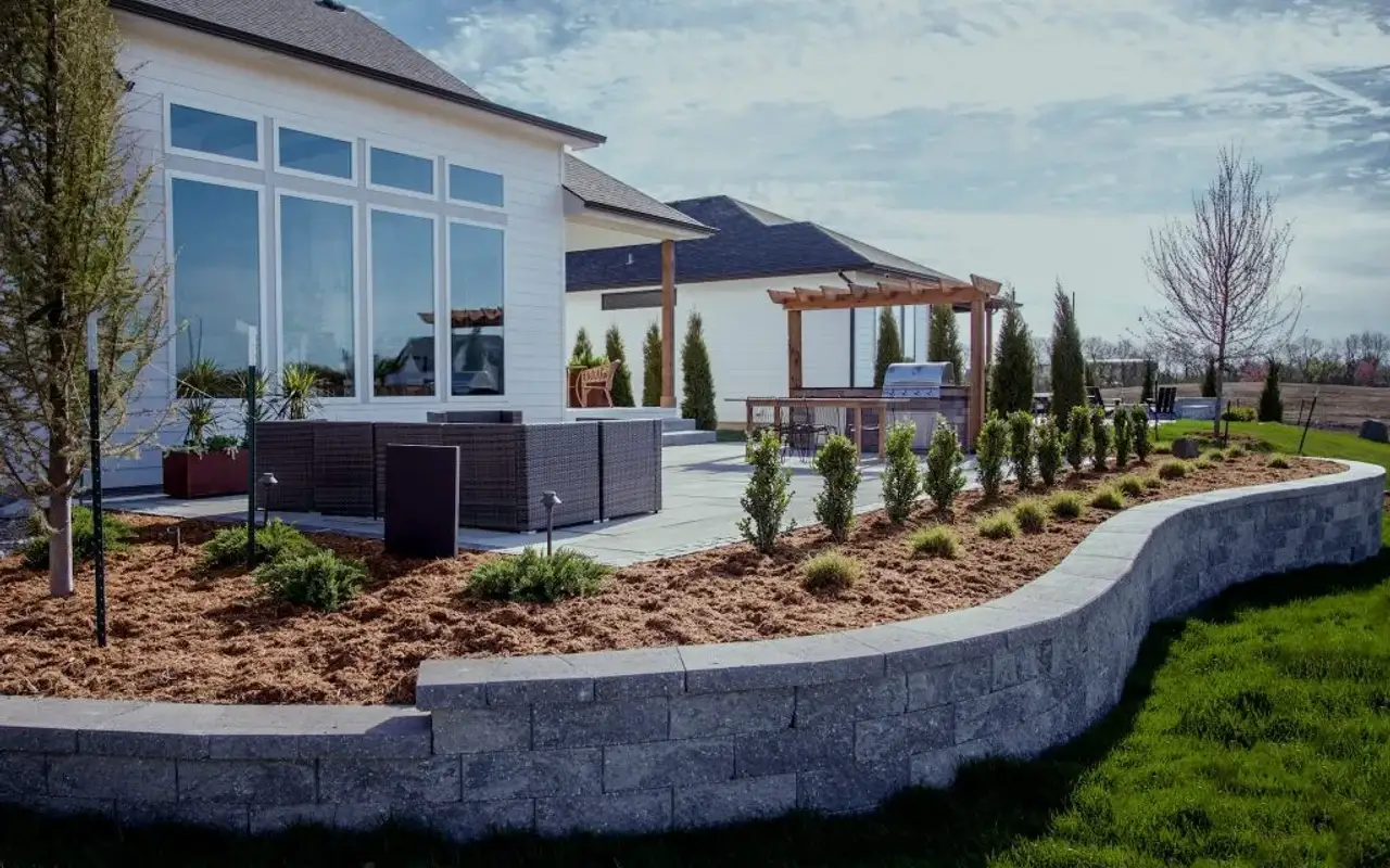 Backyard retaining wall landscaping